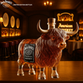 A bull-shaped whisky bottle