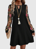 Jolanta | An elegant dress with a V-neck and striking sleeves