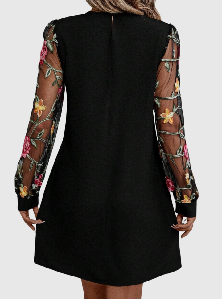 Jolanta | An elegant dress with a V-neck and striking sleeves