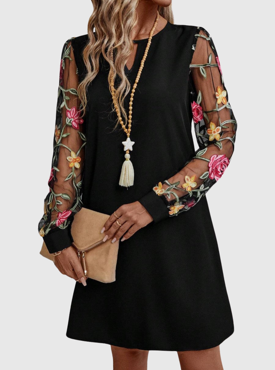 Jolanta | An elegant dress with a V-neck and striking sleeves