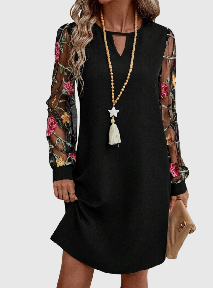 Jolanta | An elegant dress with a V-neck and striking sleeves
