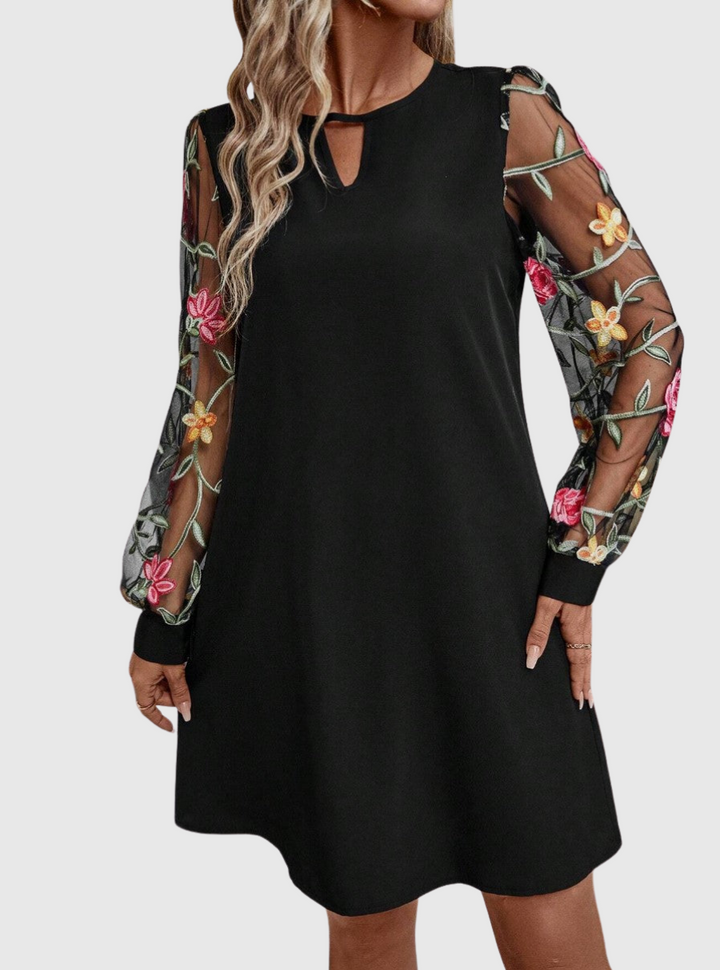Jolanta | An elegant dress with a V-neck and striking sleeves